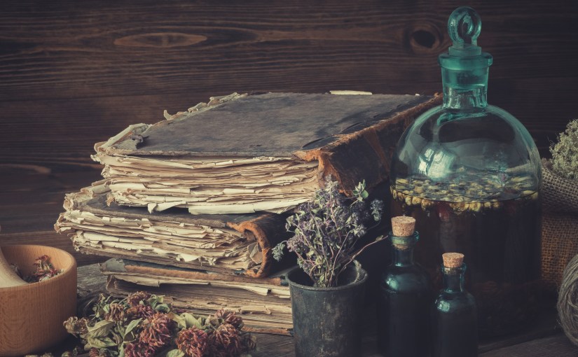 Old books, apothecary bottle herbs
