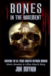 Cover of Bones in the Basement. Blood dripping down black cover with skull superimposed over Victorian house.